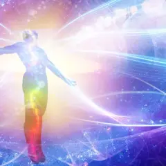 Silhouette of a person with arms outstretched, surrounded by colorful, swirling energy and cosmic elements.