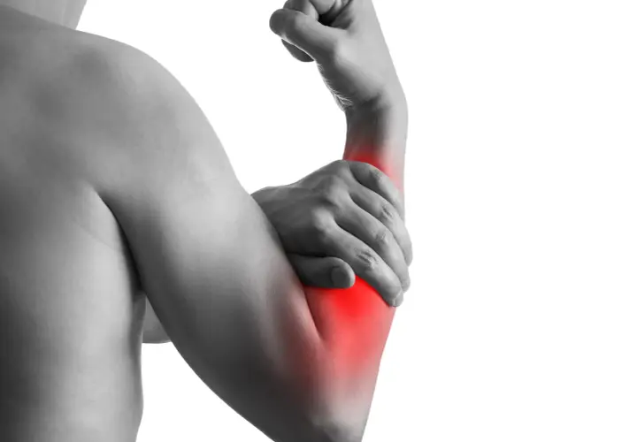 Person holding their right arm, with a red area highlighting pain or tension in the elbow and forearm.