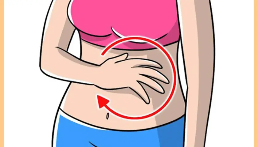 Mano che massaggia la pancia con un cerchio rosso e freccia. Scopri come il massaggio dimagrante pancia funziona per te.